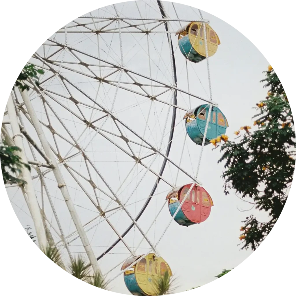 circle cropped photo of a ferris wheel