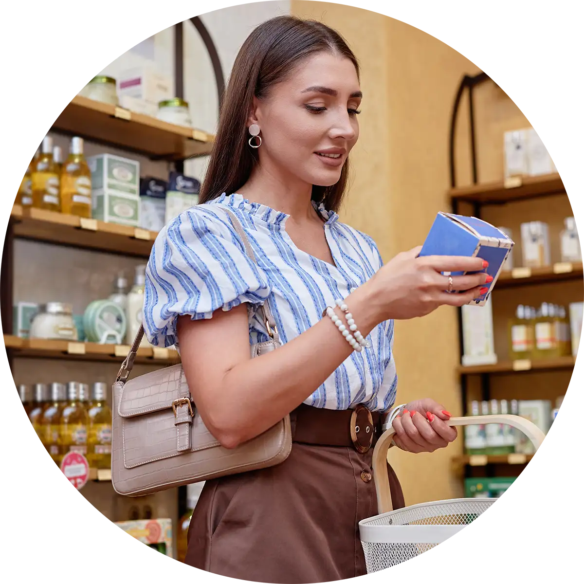 woman looking at cream box in store